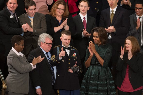 Image: US Army Ranger Sergeant First Class Cory Remsburg gives a thumbs up while receiving a standing ovation during the State of the Union.