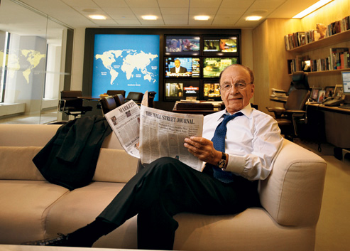 Rupert Murdoch reading his crown jewel, The Wall Street Journal. Image via Luxedb Magazine