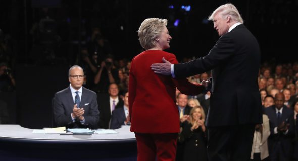 HEMPSTEAD, NY - SEPTEMBER 26:  Democratic presidential nominee Hillary Clinton shakes hands with Republican presidential nominee Donald Trump during the Presidential Debate at Hofstra University on September 26, 2016 in Hempstead, New York.  The first of four debates for the 2016 Election, three Presidential and one Vice Presidential, is moderated by NBC's Lester Holt.  (Photo by Joe Raedle/Getty Images)