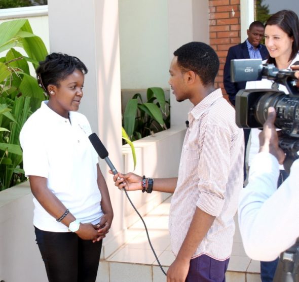 A 2014 picture of me doing an interview with a University Student in Kigali, Rwanda