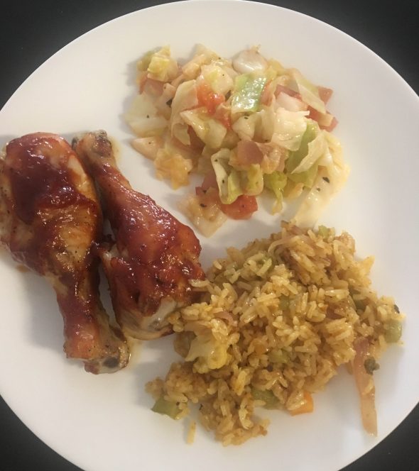 Barbecue chicken, vegetable biriyani and a cooked cabbage mix. Photo by Tynin Fries